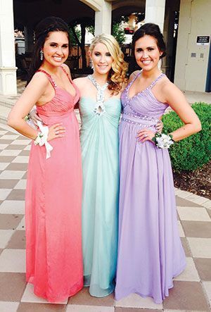 Whitney Hill, center with friends, Emily Sunshine, left, and Allie Sunshine at Plano West Senior High Prom, 2014.