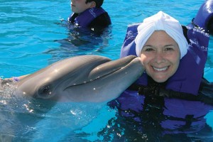 Swimming with the dolphins….Lauren celebrates the end of cancer treatment in Cabo, Mexico with friends and family.