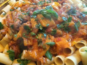 Chicken and peppers over pasta