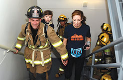 You can help by attending events that are working to make a cure for cancer a reality like the Leukemia & Lymphoma Society's annual Big D Climb, Pictured here: A Dallas firefighter, whose 2-year old son, Max, has a rare form of leukemia, joined over 2300 participants to climb 70 stories at Bank of America Plaza, the tallest building in downtown Dallas, in support of blood cancer research.  Over 50 Dallas firefighters made the climb in full gear.  Since its inception, the event has raised over $1,000,000.