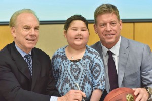 Children’s Cancer Fund Gala Chairmen, Roger Staubach and Troy Aikman with young friend, Hayden Ritchie. The April 22nd event includes a children’s fashion show, where pediatric cancer patients and survivors, all escorted by celebrities, steal the spotlight. All proceeds go toward advancing research and treatment programs in pediatric oncology. 