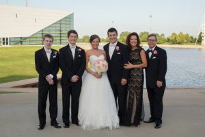 Ginny celebrating the marriage of son Tanner last year with (L to R) Caleb, Cody, daughter-in-law, Lindsay, and husband, Dan.
